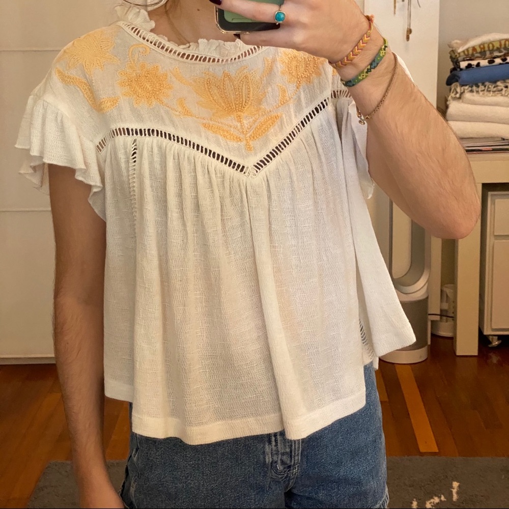 Free People white flowy top with beaded detail